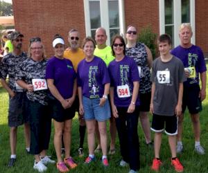 Manchester Tank Quincy commandite des participants pour les 14e course/marche de 5 km et course de 10 km annuelles Raider Classic
