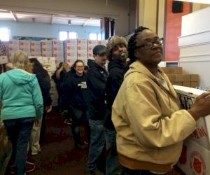 Manchester Tank Quincy team fills food baskets for the needy