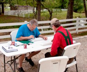 Pictured L-R:  Tyler Coupling team members Jeff Morris and Randy Witherspoon perform Stream Team Monitoring Activities along the Pomme de Terre River